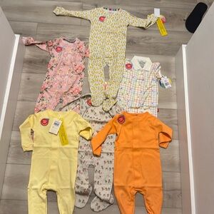 6 new with tags magnetic me pajamas/ onesie